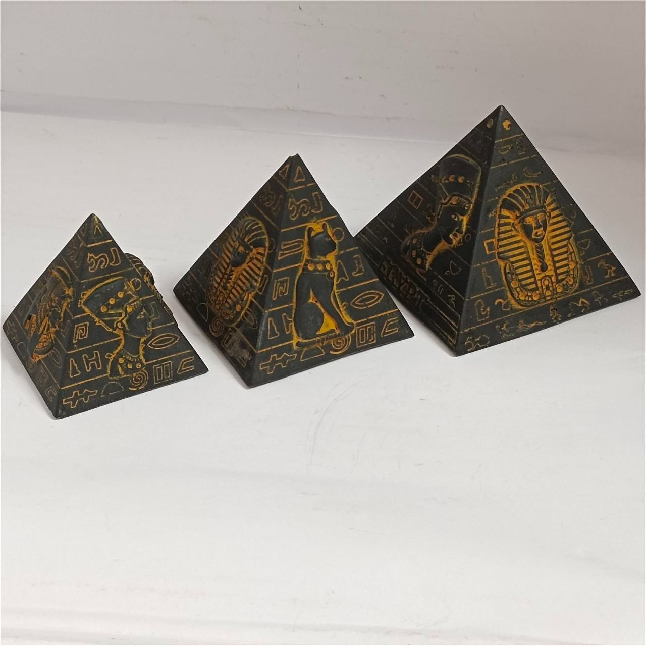 Elegant Egyptian decor with pyramids, hieroglyphs, and pharaoh motifs, ideal gif