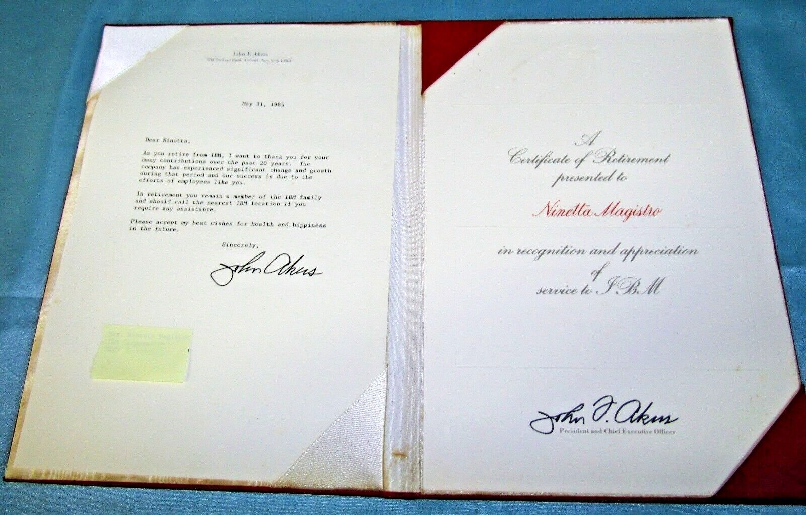 Signed Original Certificate of Retirement from IBM CEO JOHN F. AKERS dated 1985
