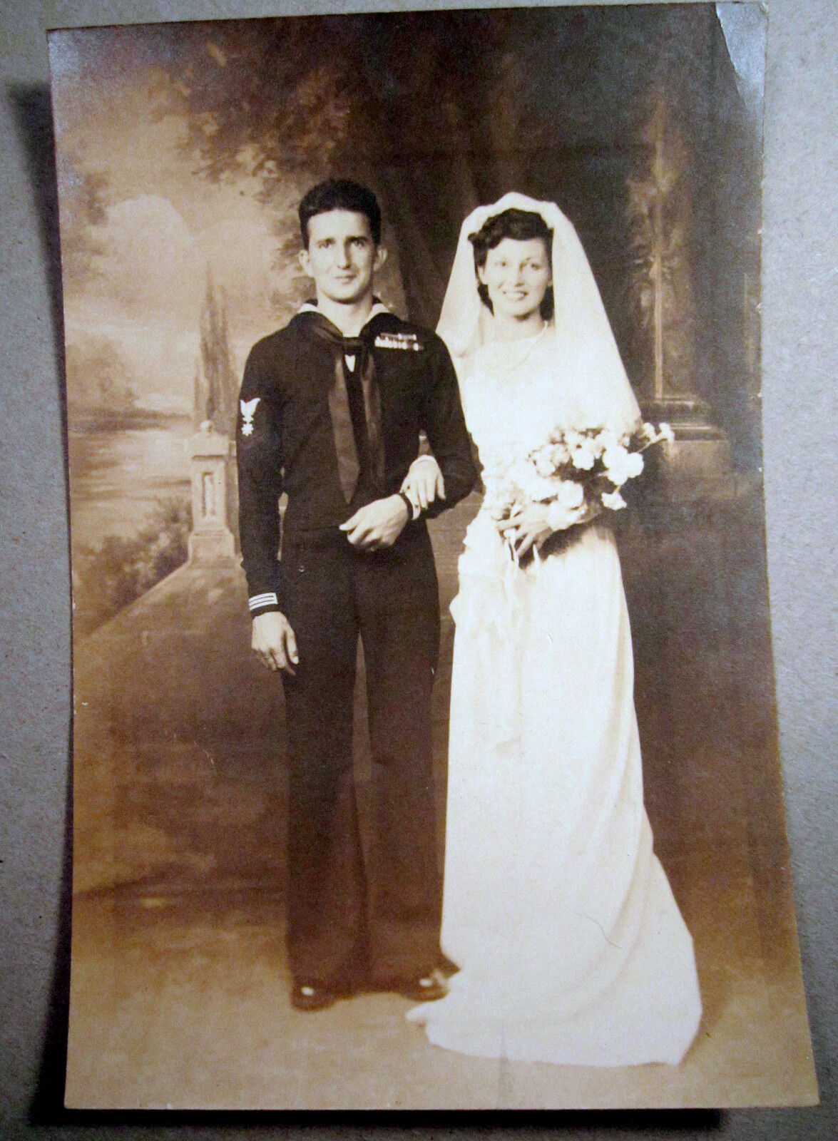 Military Soldier and Bride in Full Veil and holding Flowers Antique Photograph 