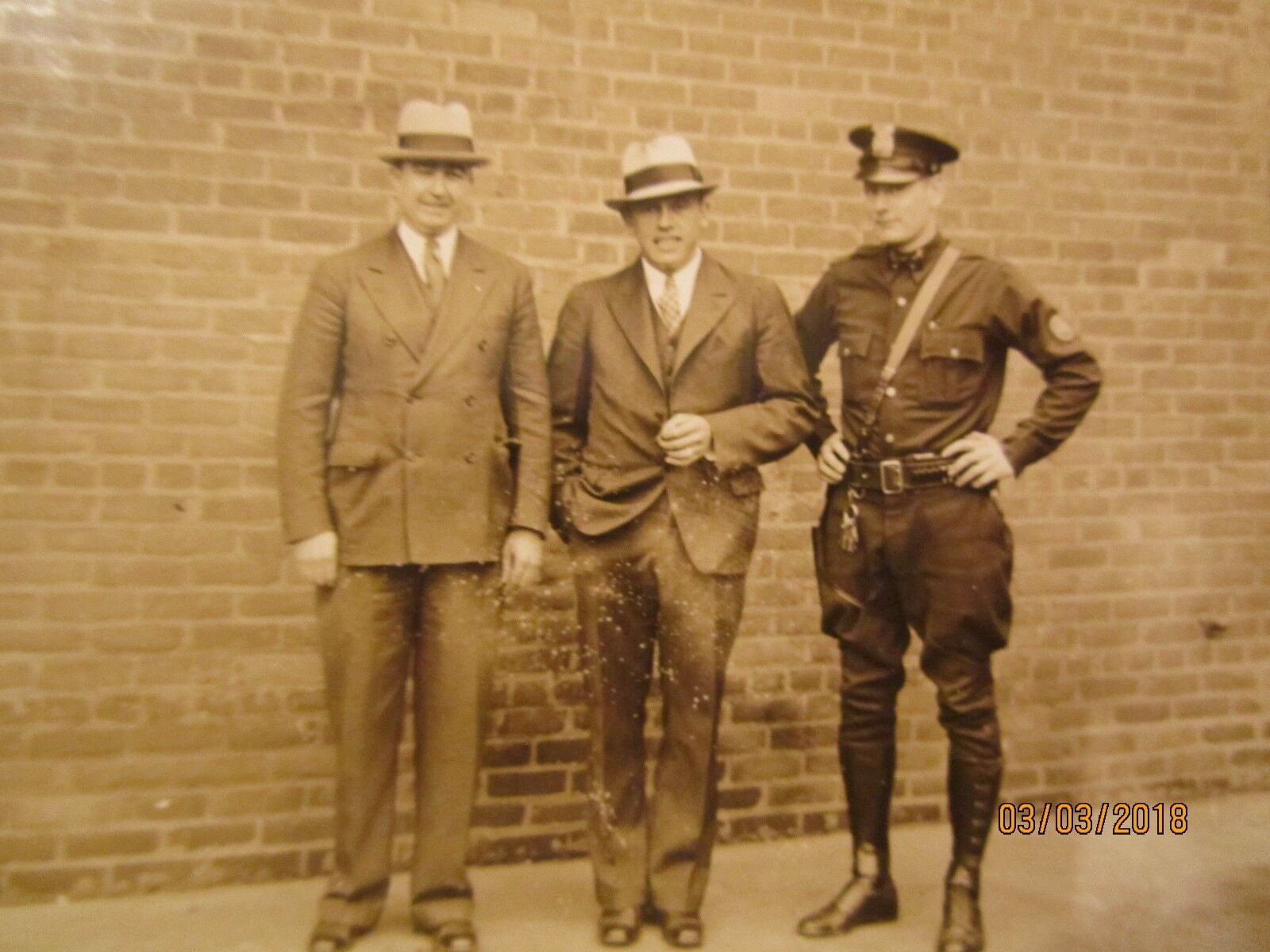 Real Photo of Motorcycle Patrolman with Two Men in Suits