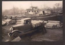REAL PHOTO CAIRO ILLINOIS CARROLL LUMBER YARD OLD TRUCK BOAT POSTCARD COPY picture