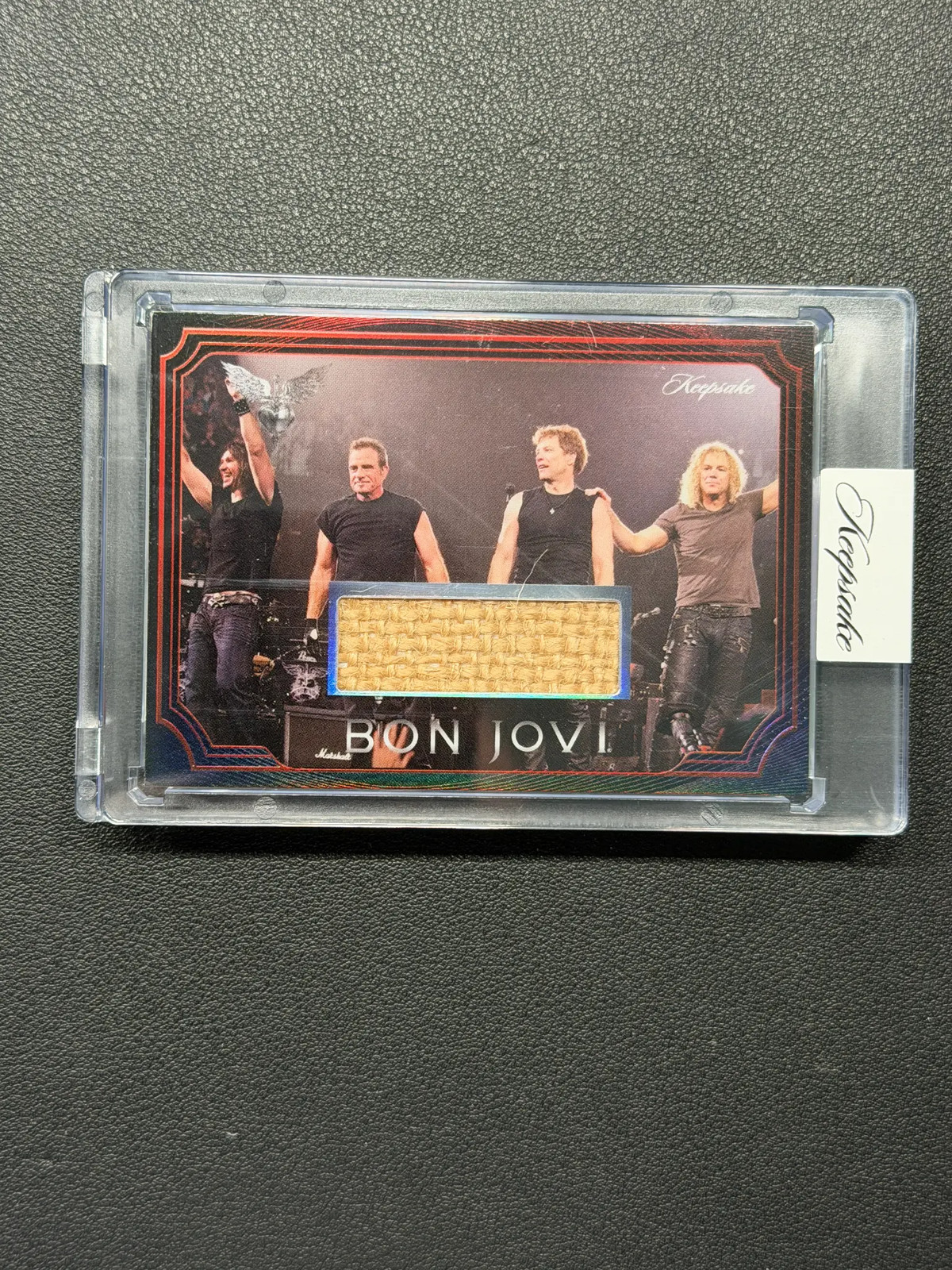 2026 Keepsake Bon Jovi #20 Fabric Artifact 85/89 Encased 2026 Keepsake Bon Jovi #20 Fabric Artifact 85/89 Encased