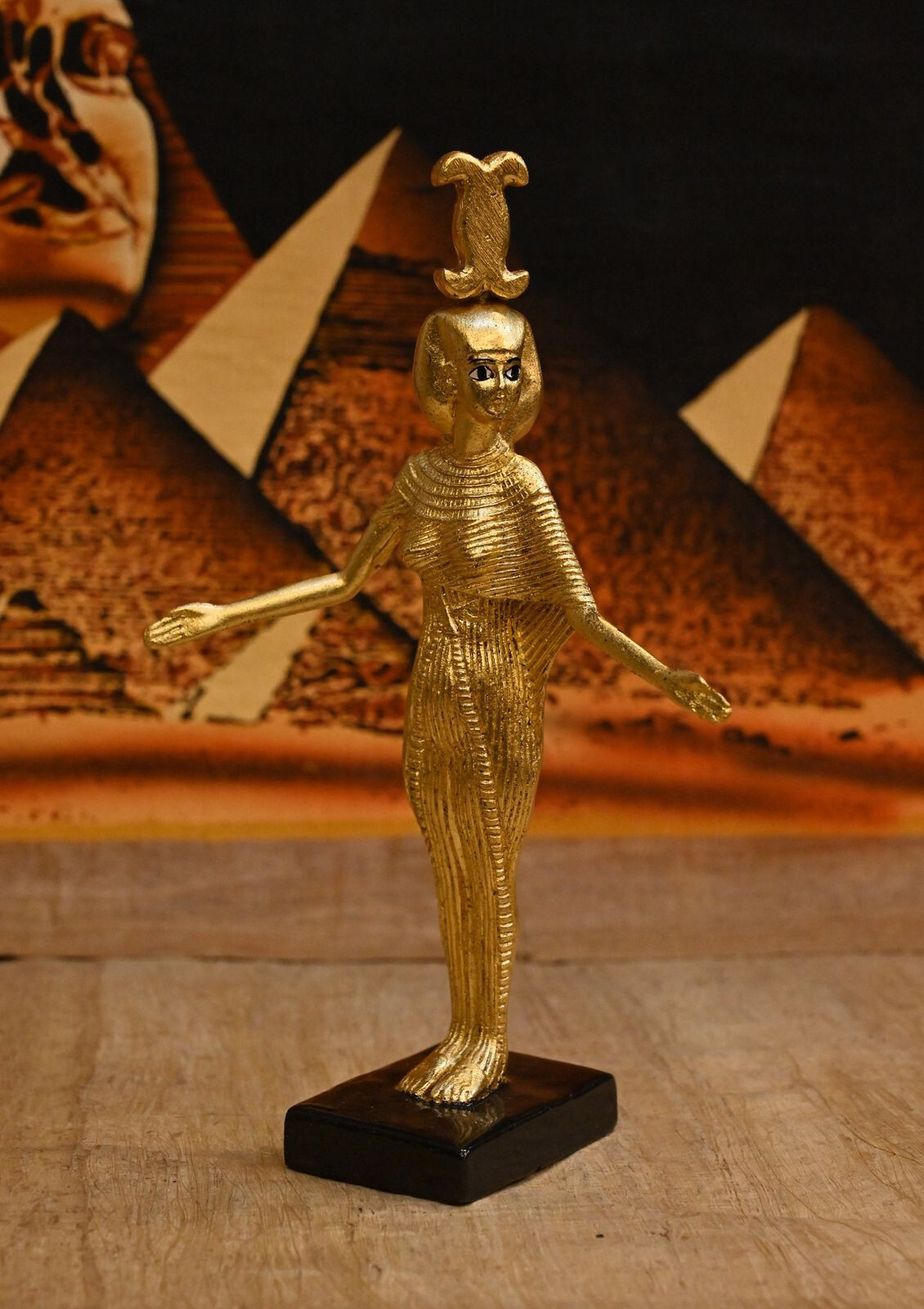 Ancient Egyptian Artifacts goddess Neith holds her symbol above her ...
