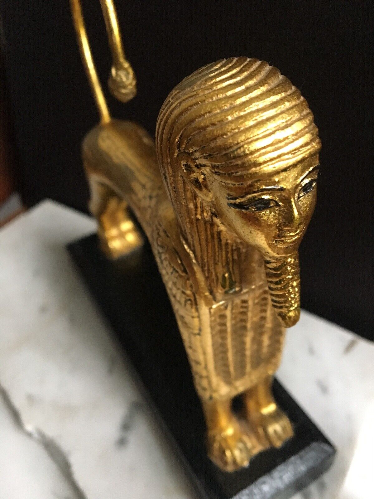 Egyptian composite figure: Pharoah? with lions body..gold painted..on base 