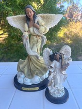 Ebony Treasures Angel Figurine Standing on Clouds Serene Heaven Decor picture